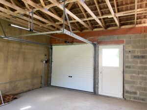 pose de porte de garage + fenêtre + porte - agen - renoverso 3